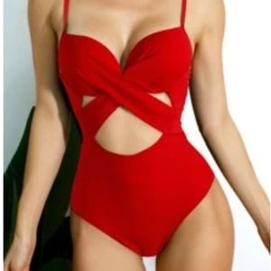 Red one piece swimsuit with cut out detail